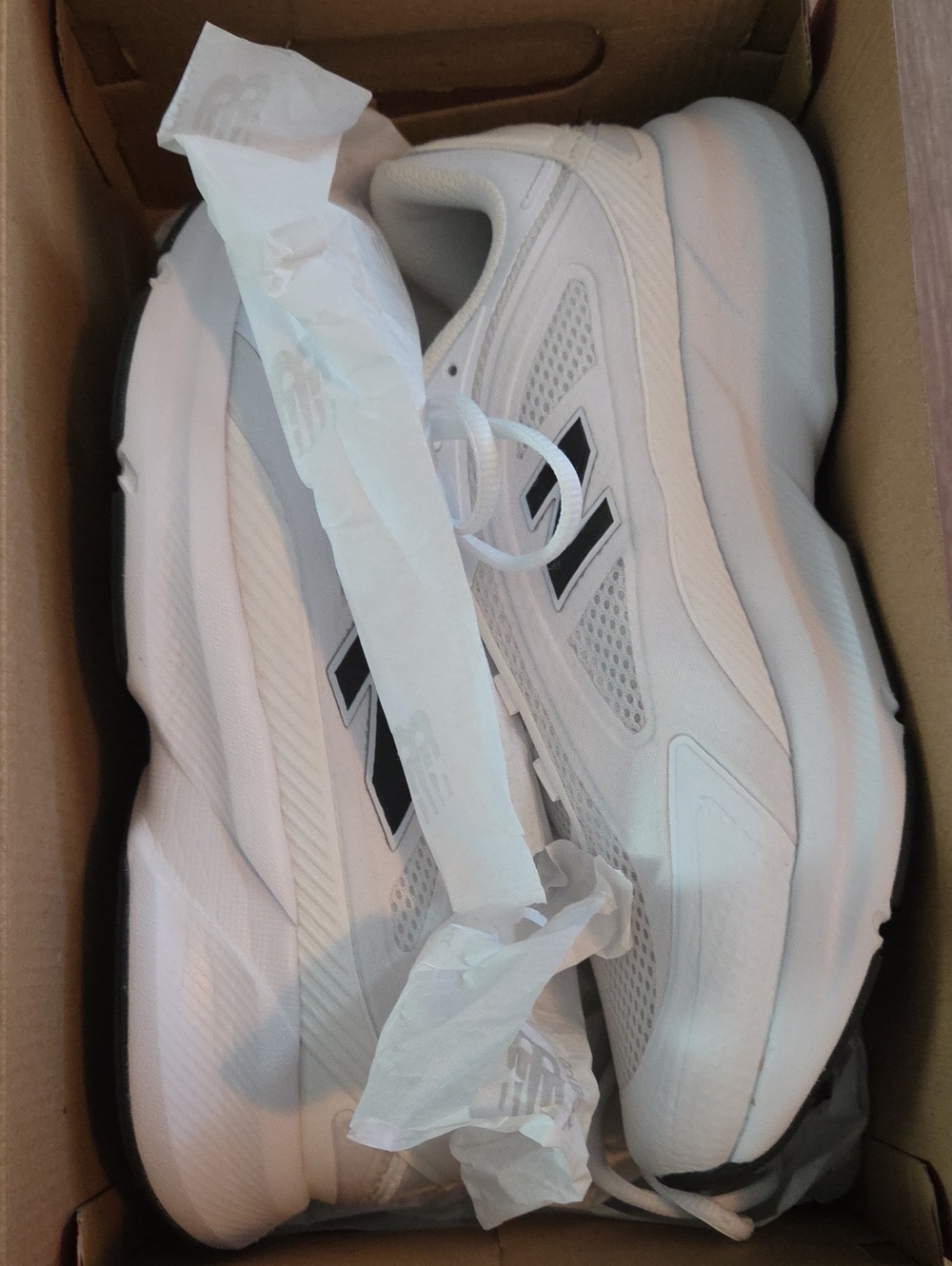 New Balance Women's White Sneakers with Black 'N' Accents